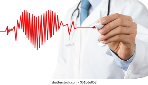 Male Doctor Drawing Heart Symbol At The Whiteboard