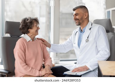 Male doctor giving medical consultation to female senior patient. Friendly physician looking at old woman, talking to her, trying to support - Powered by Shutterstock