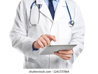 Male Doctor Holding Modern Tablet On White Background, Closeup