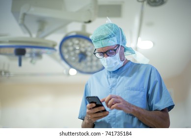 Male Doctor Using Smartphone