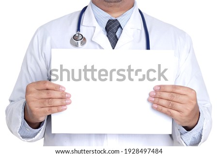 A male doctor with a white paper There is room for writing a message. White background. Concept of medical services. Copy space
