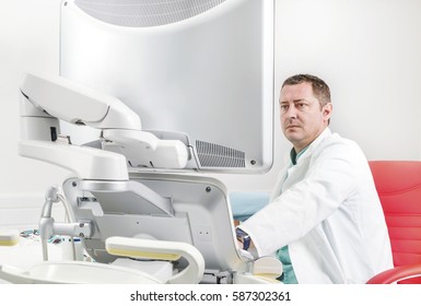 Male Doctor Wperforming Echocardiography Exam