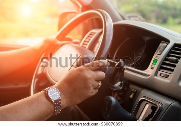 male driving car. select\
focus.