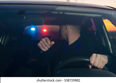 Male drunk driver chased by police. Driving under alcohol influence