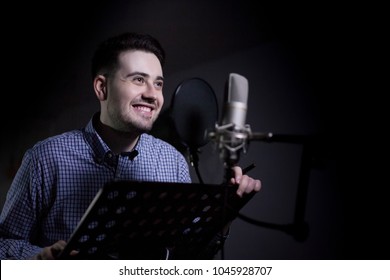 Male Dub Actor Performing In Dubbing Room And Smile