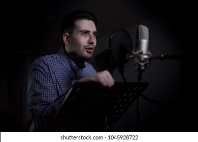 Male Dub Actor Performing In Dubbing Room