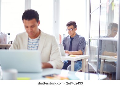 Male Employee Networking In Office