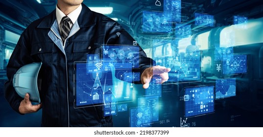 Male engineer operating a hologram screen in a factory. - Powered by Shutterstock