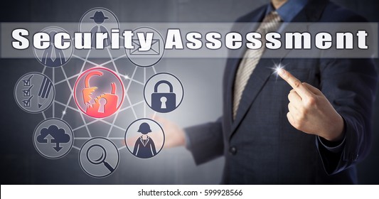 Male Enterprise Consultant In Blue Business Suit Is Initiating Security Assessment. Information Technology Metaphor And Cyber Security Concept For Internal Audit Procedure Or Outsourced Auditing.