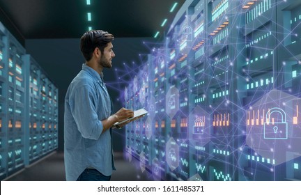 Male IT Expert Holding A Laptop To Check Their Work
The Server In The Data Center, The Server Rack Is Ope,cyber Security Concept