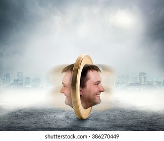 Male Face On Two Sides Of The Coin