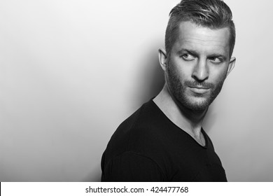 Male Fashion Concept. Portrait Of Young And Handsome Red(ginger) Man Posing Over Grey Background. Close Up. Studio Shot