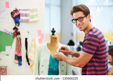 Male Fashion Designer In Studio