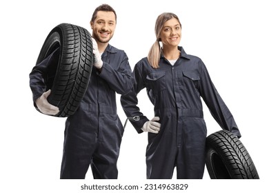 Male and female car mechanic workers carrying tires isolated on white background - Powered by Shutterstock