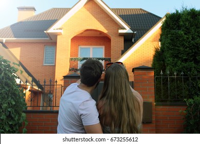 male and female are choosing new home - Shutterstock ID 673255612