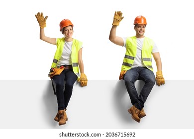 Male And Female Construction Workers Sitting On A Panel And Waving Isolated On White Background