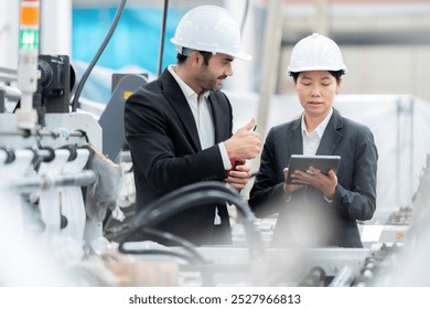 Male and female engineers play a crucial role in the business world, inspiring the next generation to embrace innovation and demonstrating how it can lead to transformative changes globally. - Powered by Shutterstock