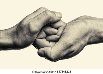 Male and female hand  united  in  handshake. That could mean help, guardianship, protection, love, care etc. This Image isolated for easy  transfer in your design.
