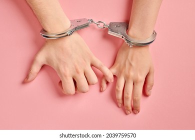 Male and female hands in handcuffs. Love forever. Prenuptial agreement, duties of love couple. - Shutterstock ID 2039759570