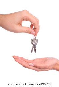 Male And Female Hands Handing Over The Keys