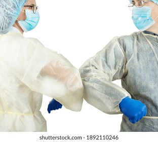 Male And Female Medical Co-workers Greet Each Other With  Elbow Bump To Avoid Virus Spread Or Contamination. White Background