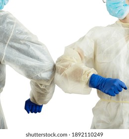 Male And Female Medical Co-workers Greet Each Other With  Elbow Bump To Avoid Virus Spread Or Contamination. White Background