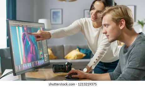 Male and Female Professional Editors Talk while Working in Photo Editing App / Software on a Personal Computer. Photo Editors Retouching Photos of a Beautiful Girl. Mock-up Software Design. 