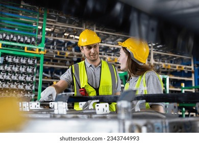 Male and Female worker inspect goods auto parts on shelves in warehouse. logistic import export auto parts. Checklist stock product in storage for logistic. - Powered by Shutterstock