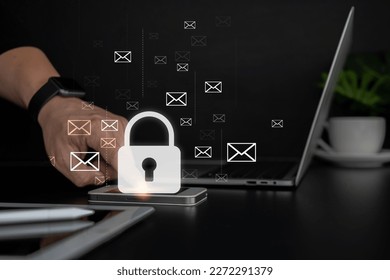Male finger touching smartphone lock icon, business technology.Protect a cyber security from hacker attacks and save clients confidential data.Padlock Hologram icons over the typing hands. - Shutterstock ID 2272291379