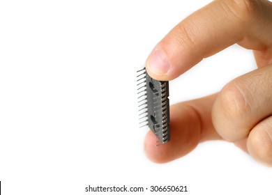 Male Fingers Holding Microchip Isolated On White