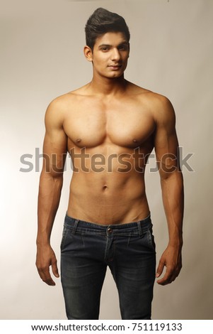Male Fitness Model Bodybuilder Squeezing Juice Stock Photo 