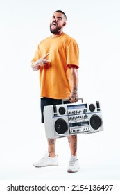 Male Fitness Model, Man Showing Muscles. Posing With Old School Radio.
