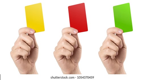 Male Football (soccer) Referee Hand Holding Yellow, Red And Green Cards, Isolated On White Background