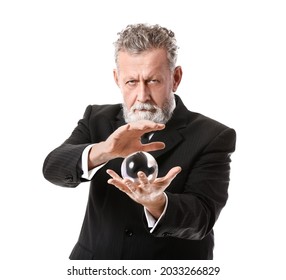 Male Fortune Teller With Crystal Ball On White Background