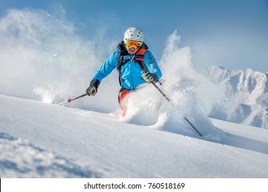 Male Freeride Skier In The Mountains