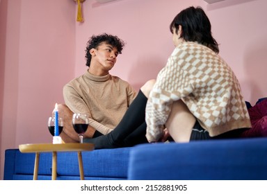 Male Gay Couple Talking At Home