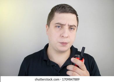 A Male Guard Talking On A Walkie-talkie With His Partner. A Policeman Takes Up The Challenge Of Public Safety. Safety And Security Concept