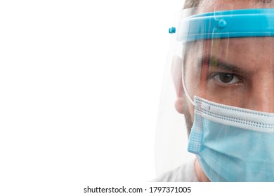 Male Half Face Wearing Medical Or Surgical Mask And Transparent Protective Shield As Covid19 Virus Infection Prevention Concept Closeup With Blank Copyspace Isolated On White Background