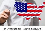 the male hand with 3D render of America map flag nation with stars and stripes