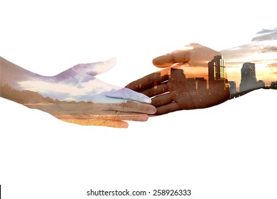 Male Hand Blend With Cityscape Silhouette Handshake With Female Hand Blend With Sea Beach Concept Of Land Development While Preserving Environment