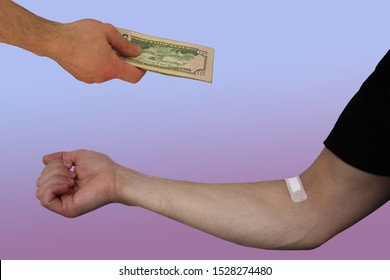 Male Hand With Dollar Bills And A Hand Sealed On The Inside Of The Elbow With A Medical Plaster, Blood Donation Concept, Close-up
