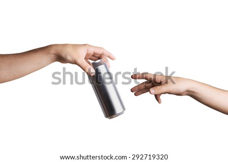 Male hand giving a beer can to another person. Isolated on white.