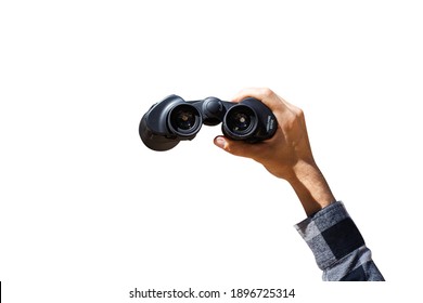Male hand are holding binoculars on white isolated background. Banner. Flat lay, top view.