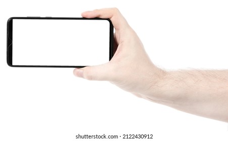 Male Hand Holding The Black New Smartphone With Blank Screen Isolated White Background. Man Hands Using Phone Clipping Path. Blank For Designer