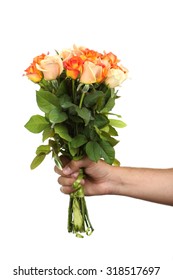 Male Hand Holding Bouquet Of Orange Roses On White Background