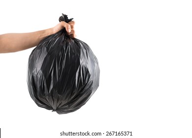 Male Hand Holding Full Trash Bag, Isolated On White