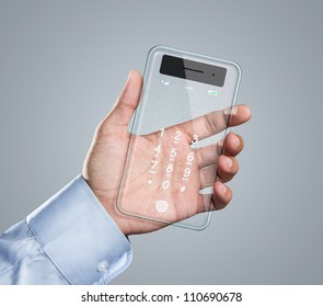 Male Hand Holding Futuristic Transparent Mobile Smart Phone With Copy Space