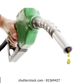 Male Hand Holding Gas Pump Isolated On White With One Last Drop Of Fossil Fuel