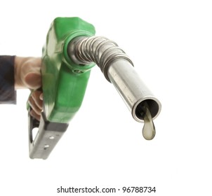 Male Hand Holding Gas Pump Isolated On White With One Last Drop Of Fossil Fuel