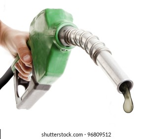 Male Hand Holding Gas Pump Isolated On White With One Last Drop Of Fossil Fuel